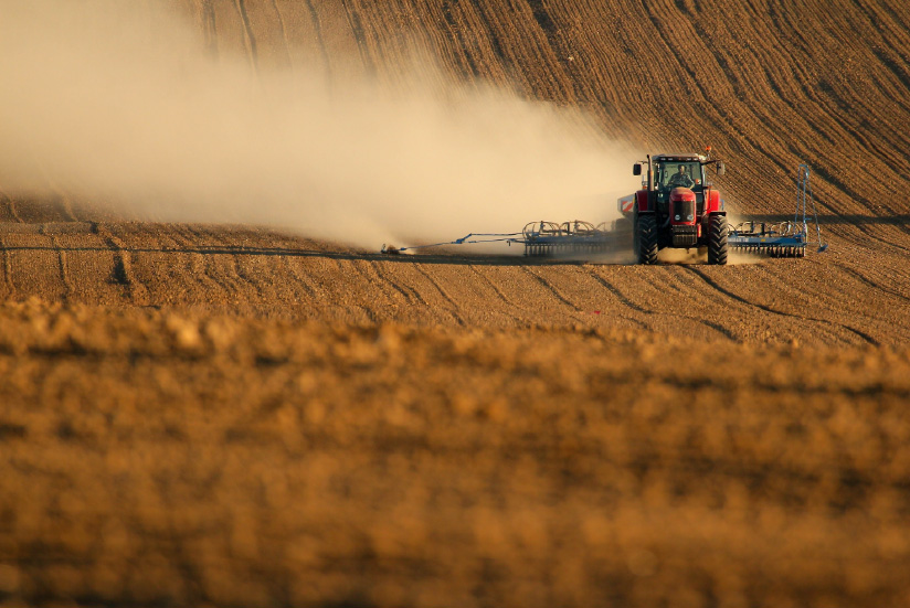 agro-industrial machinery recollecting waste for biomass energy.