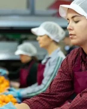 Woman working in a citrus factory