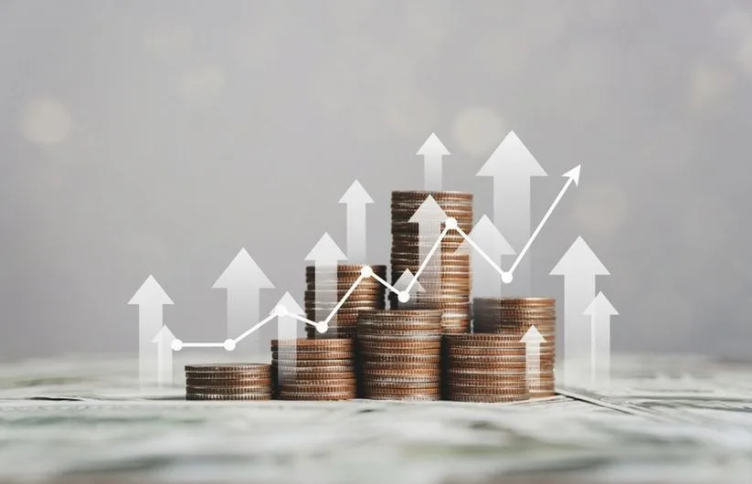 Monedas con un gráfico de inversión positiva