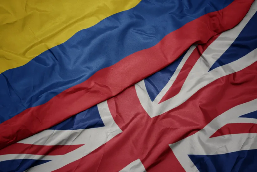 Flags of Colombia and the UK representing a commercial bridge between the countries.